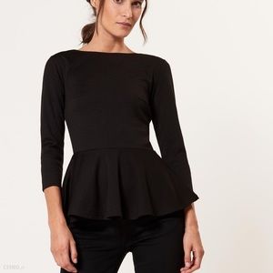 Cute black top with a heart zipper at the back XS